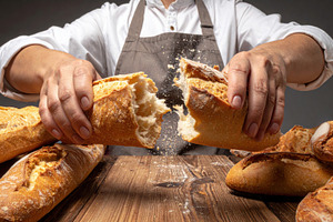 Fresh Bread Being Torn by Baker Hands, a Food & Drink Photo by Davizro's Market