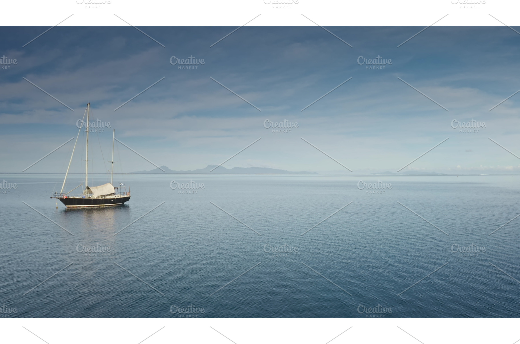 Wooden yacht anchor peacefully on, a Nature Photo by Goinyk
