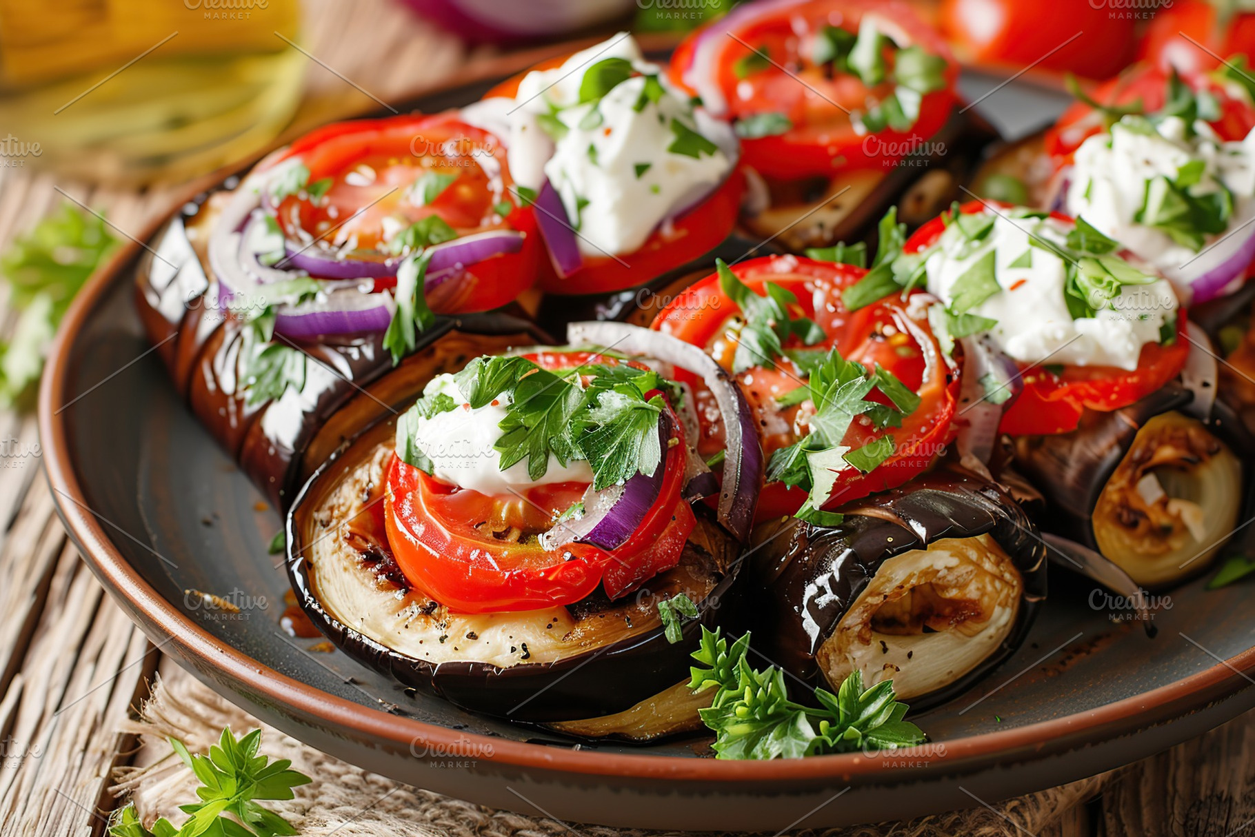 Rolled up eggplant stuffed with cheese and tomatoes in plate, a Food & Drink Photo by AlyaAnd