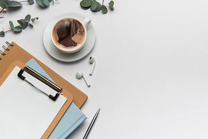 Eucalyptus, coffee cup, clipboard, notebook, pen, and wireless h, a Business Photo by Olena Rudo
