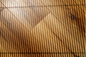 Light and shadow patterns on wooden, a Background Photo by darksoul72