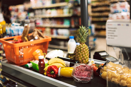 Close up shopping basket and fresh p stock photo containing supermarket