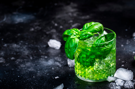 Basil smash green alcoholic cocktail drink with dry gin, sugar s, a Food & Drink Photo by 5PH