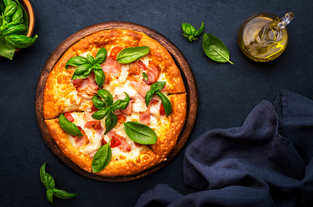 Homemade hot pizza with ham, mozzarella cheese, tomato sauce and, a Food & Drink Photo by 5PH