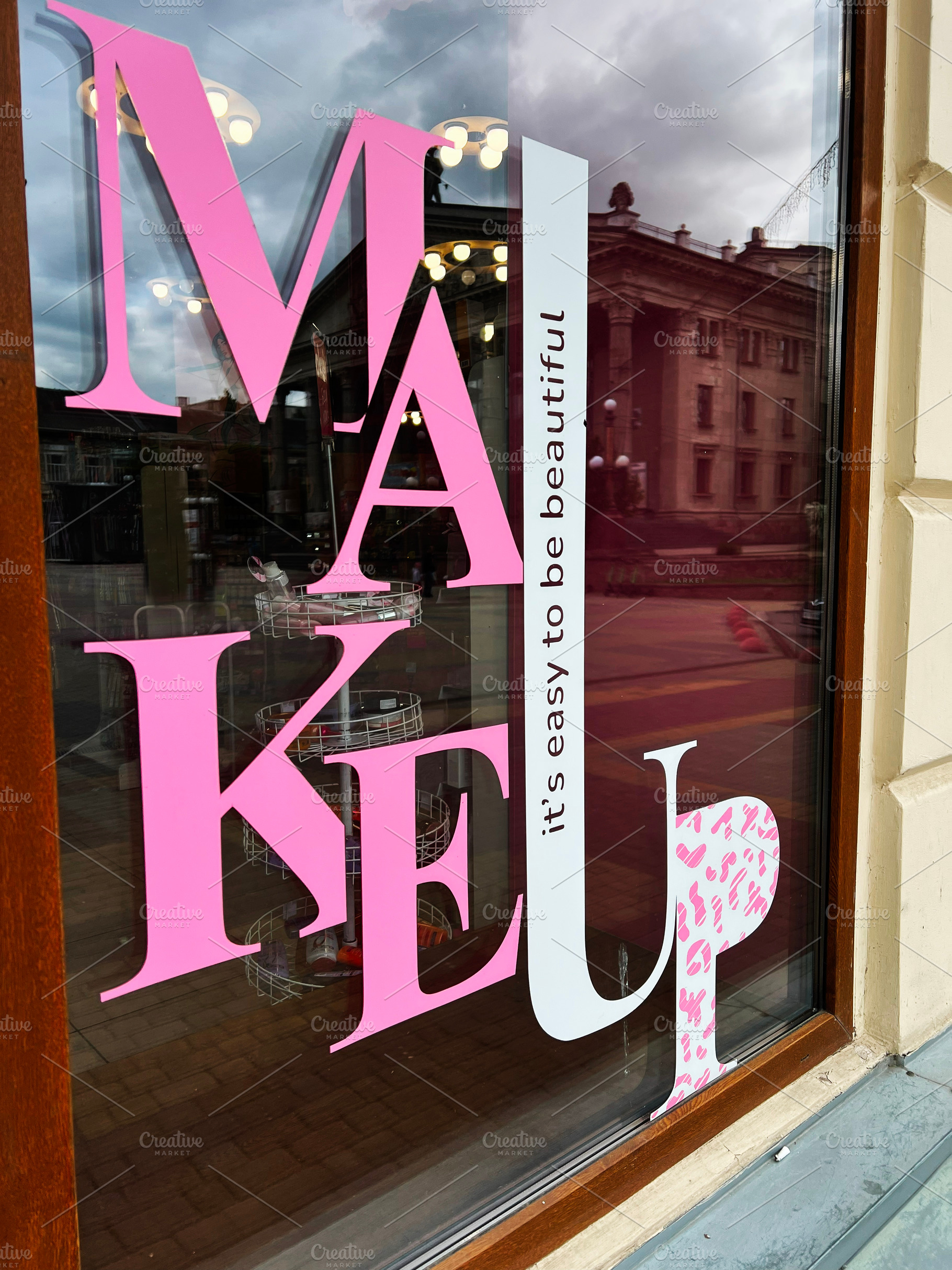 Shopfront showcasing makeup branding with stylish modern design and bold typogr, a Photo by AS photostudio