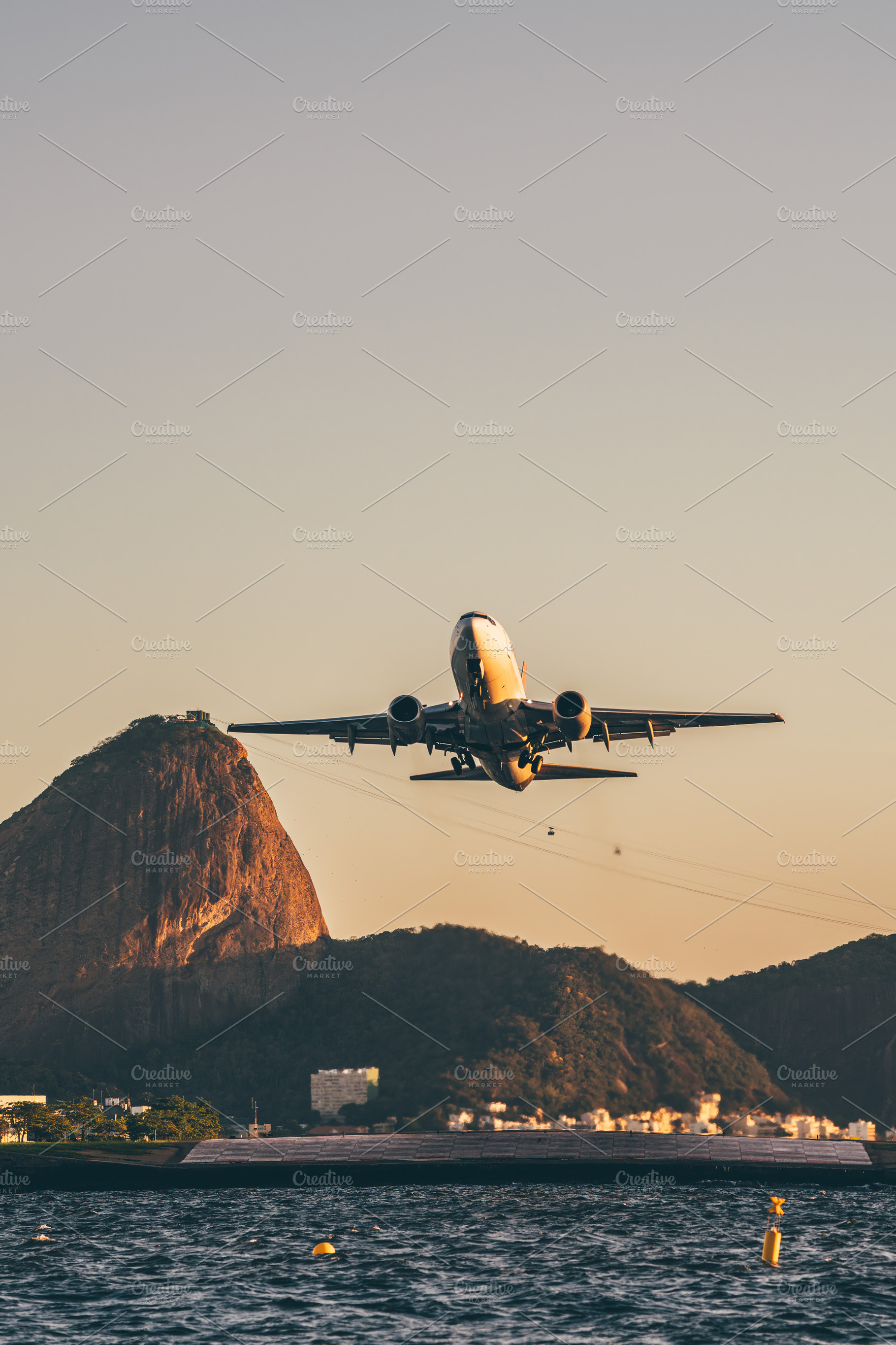 Jet over Sugarloaf at sunset, a Transportation Photo by SkyNext