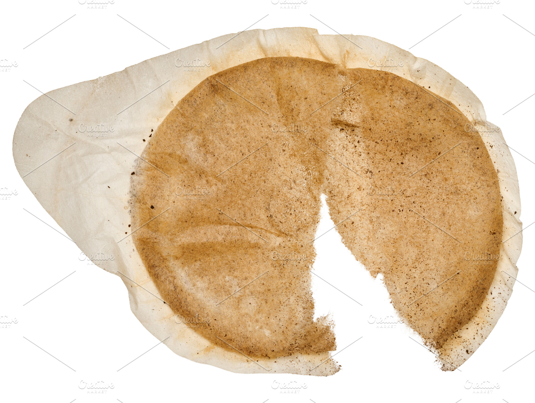 Torn round coffee capsule. Isolated background., a Food & Drink Photo by ndanko