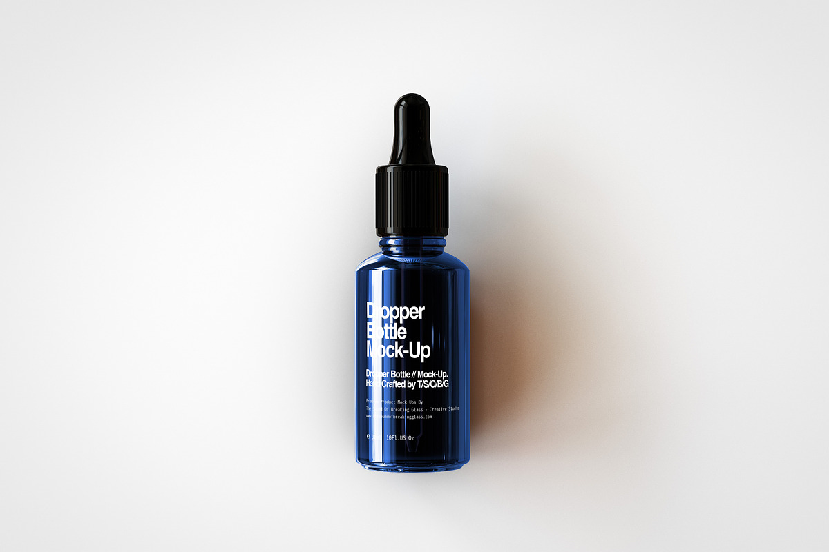 Amber Dropper Bottle Mock-Up & Box, a Household Mockup by TSOBG (Photo 11 of 20)