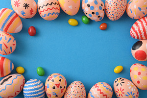 Colorful Easter Eggs Frame on Blue Background, a Holiday Photo by Davizro's Market