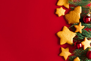 Christmas gingerbread cookies with red baubles and evergreen bra, a Photo by Sonjachni