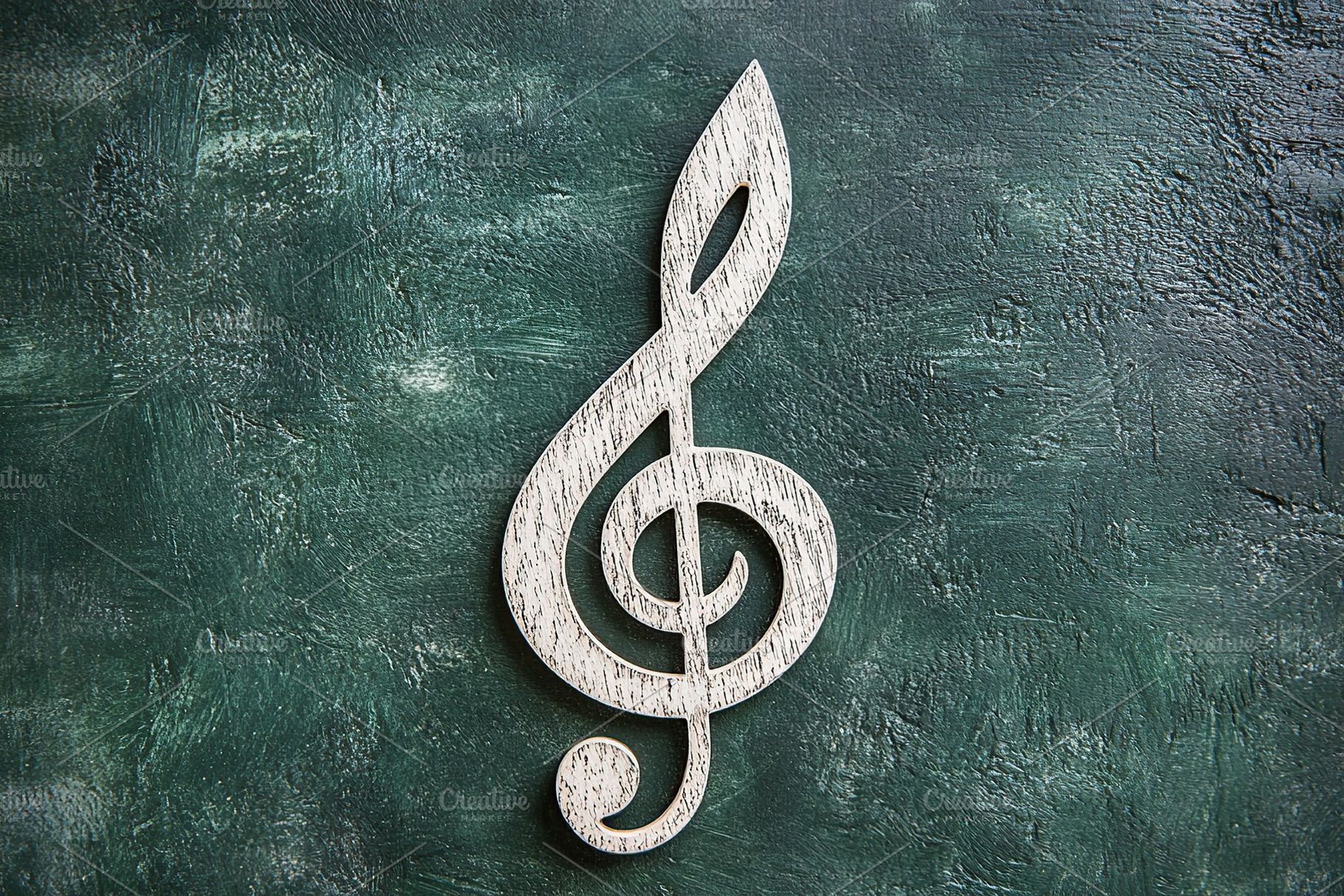 Music treble clef on green background, an Arts & Entertainment Photo by AlyaAnd
