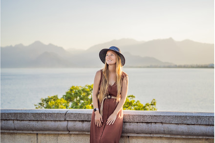 Happy woman tourist on background of, a Nature Photo by Elizaveta Galitskaya