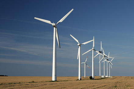 Windmills featuring green, energy, and field