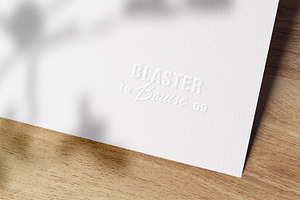 Embossed Logo Mockups On White Paper