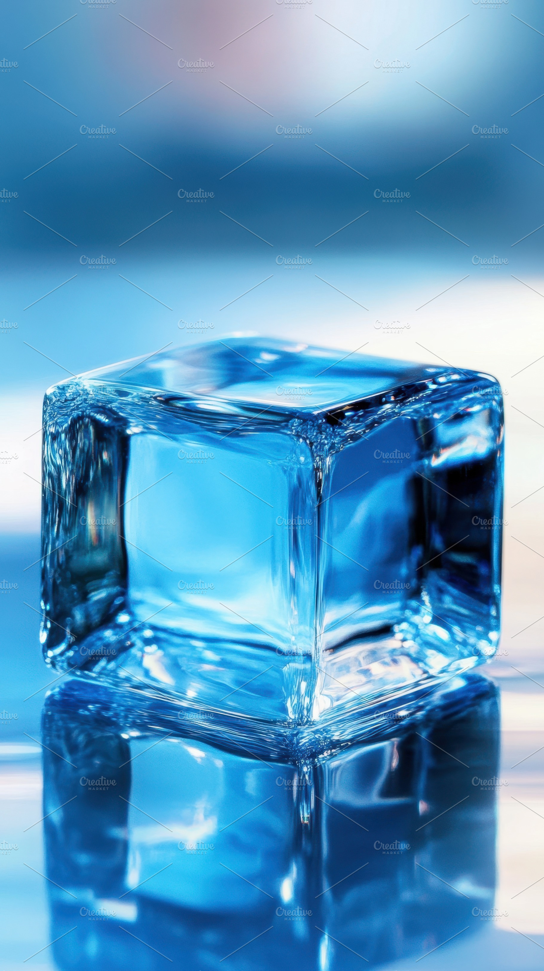 Clear ice cube on smooth surface, a Photo by Beautiful things