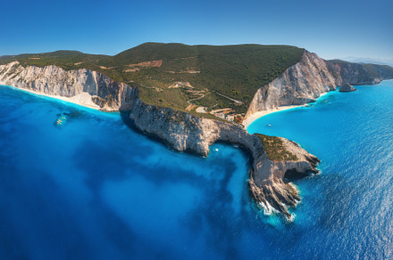 Aerial view of blue sea, mountains, white sandy beach, a Nature Photo by den-belitsky