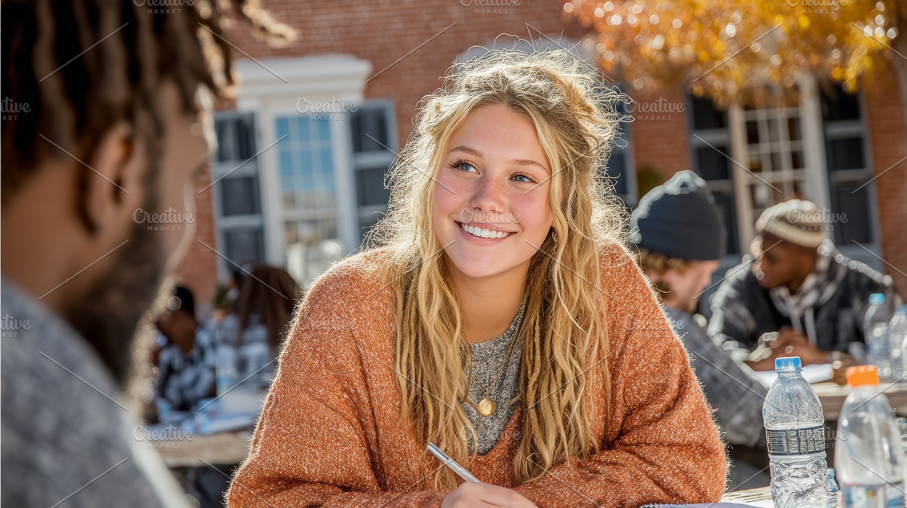 Students engaging in academic discussions outdoors in a university courtyard, a Photo by AS photostudio