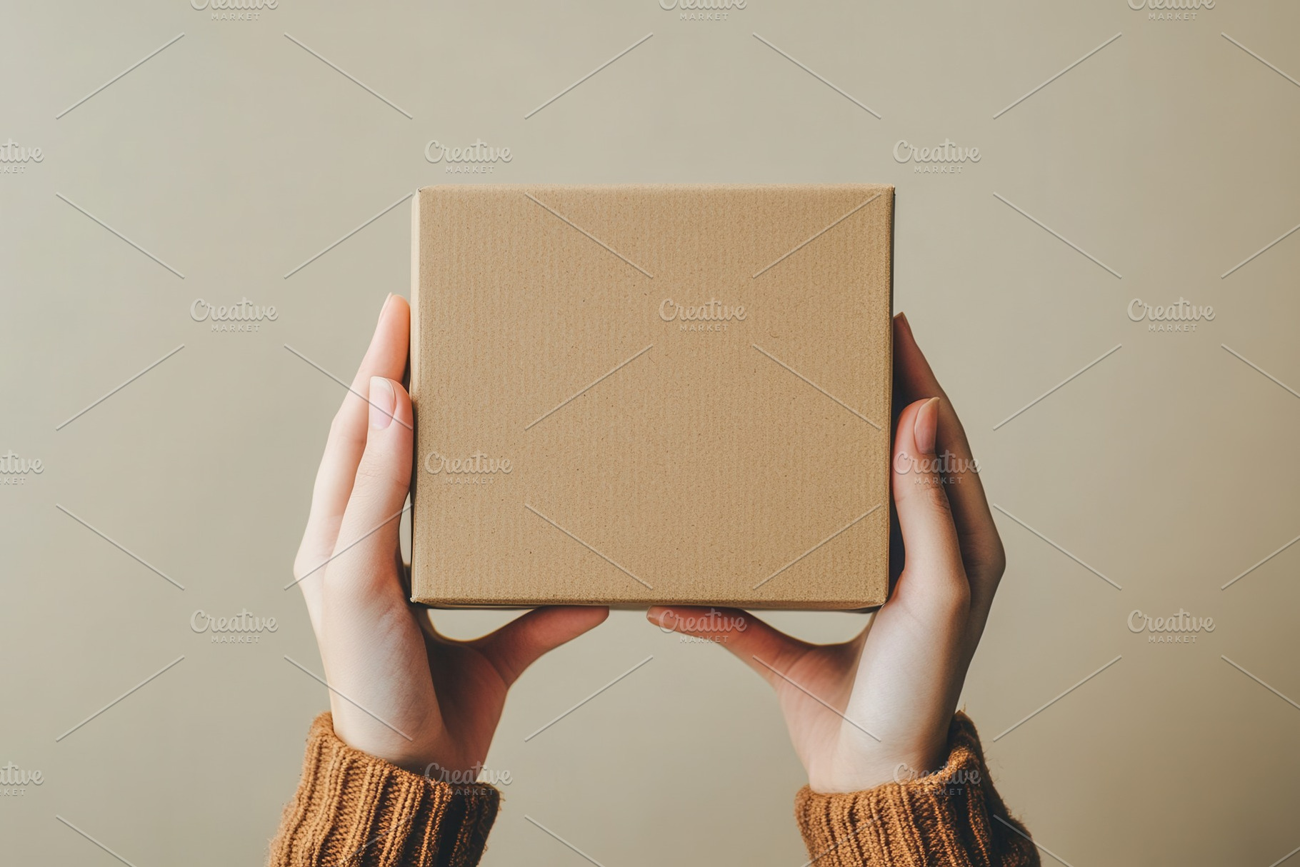 Blank square box in hands, a Photo by Pavel_design