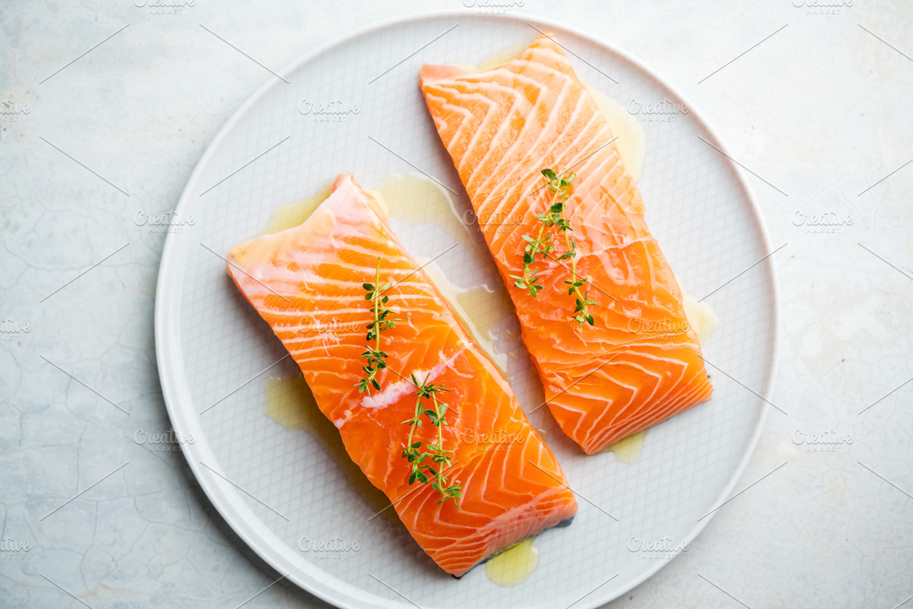 Fresh salmon fillet on a plate for delicious salmon steak., a Food & Drink Photo by FoodStock