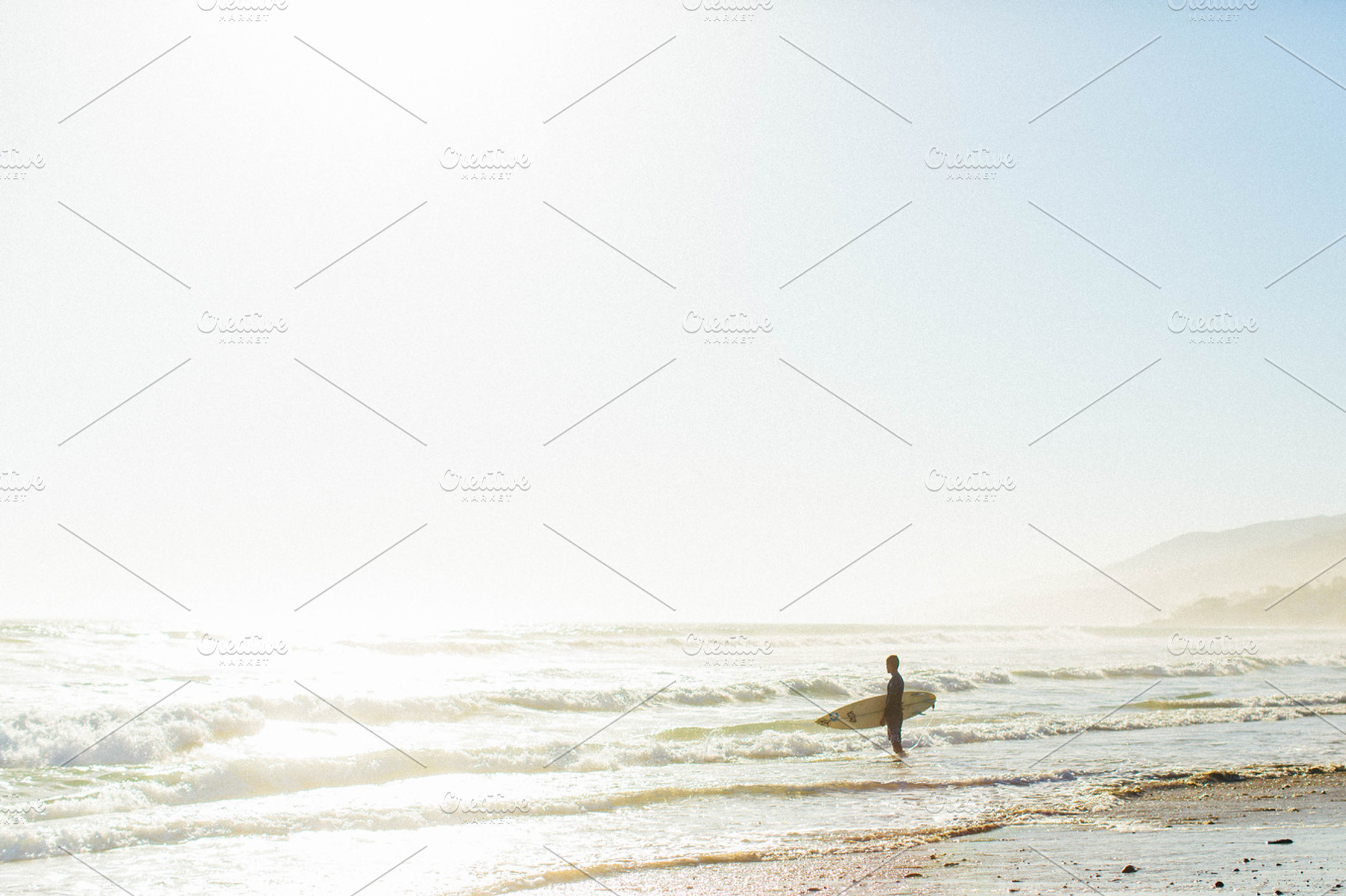 Surfer with Shore, a Sports & Recreation Photo by tamarakate