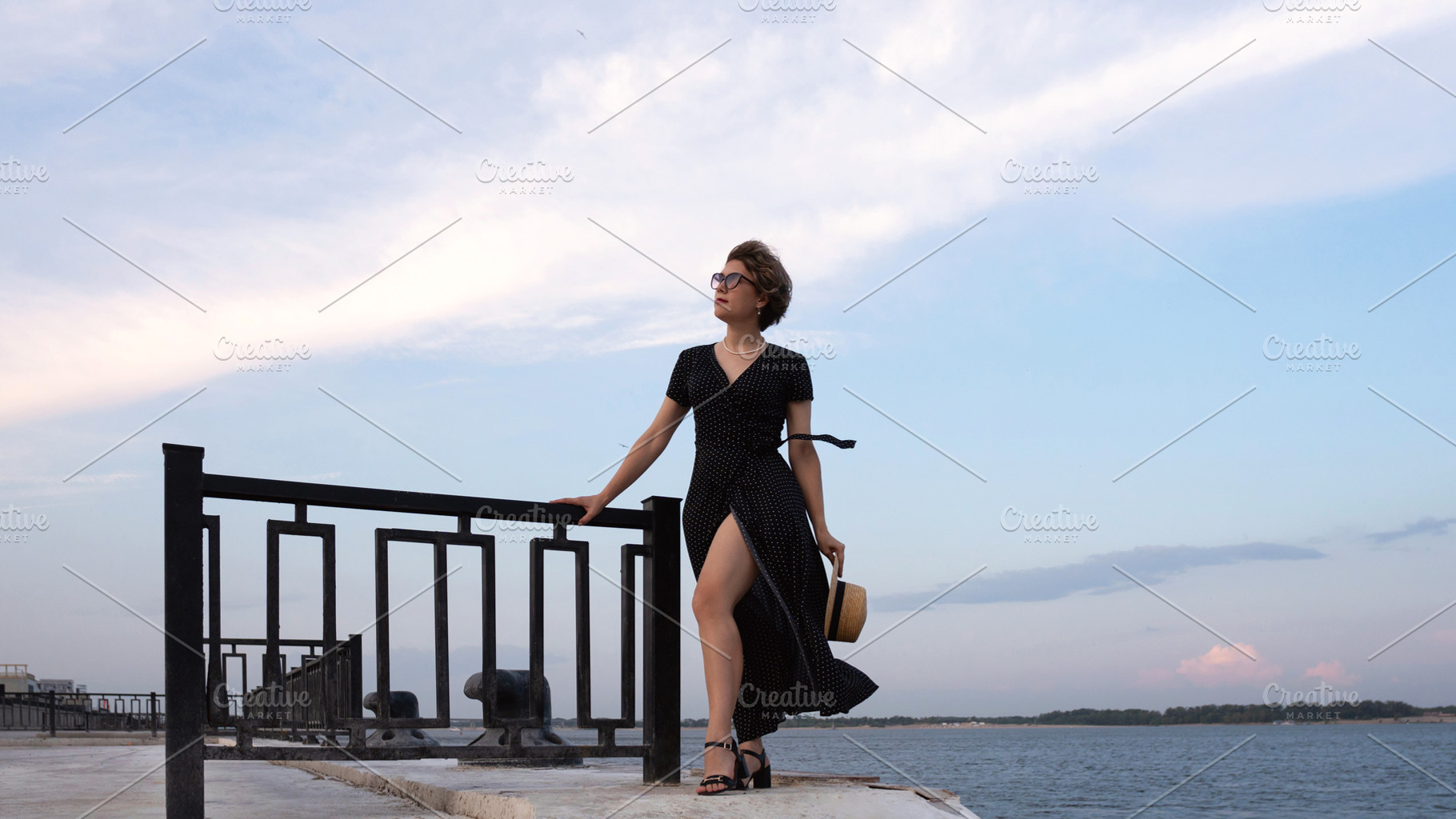 Confident woman in black dress, a Person Photo by Elena Vagengeim