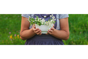 A woman in the garden collects, a Nature Photo by yanadjana