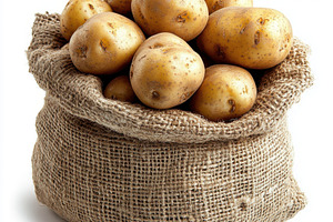 Fresh organic potato in burlap sack,, a Food & Drink Photo by Pixeness Studio