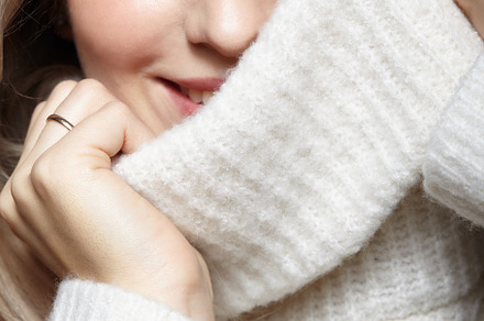 Blonde young beautiful woman dressed in white woolen sweater ., a Person Photo by Zastavkin