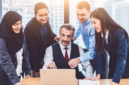 Group of multiethnic business people training by executive senio, a Business Photo by Ministocker