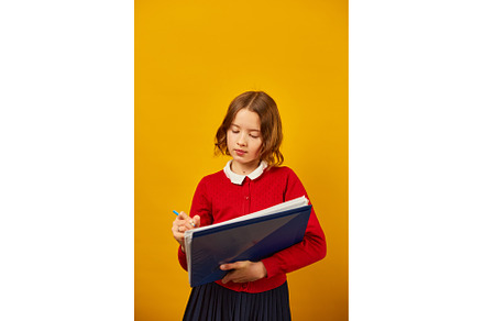 Thoughtful School teenage girl, a School & Education Photo by IlliaBondarPhotography