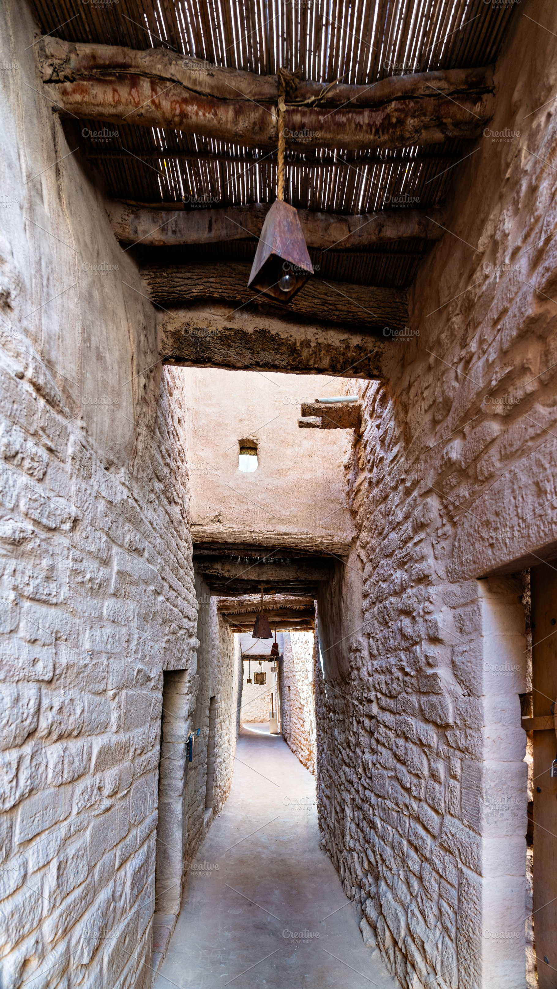 Traditional stone alleyway in AlUla Old Town Saudi Arabia, an Architecture Photo by Leonid Andronov
