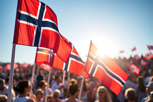 Crowd celebrating Norwegian National Day, waving vibrant flags under a bright s, a Holiday Photo by Antonio Gravante Market