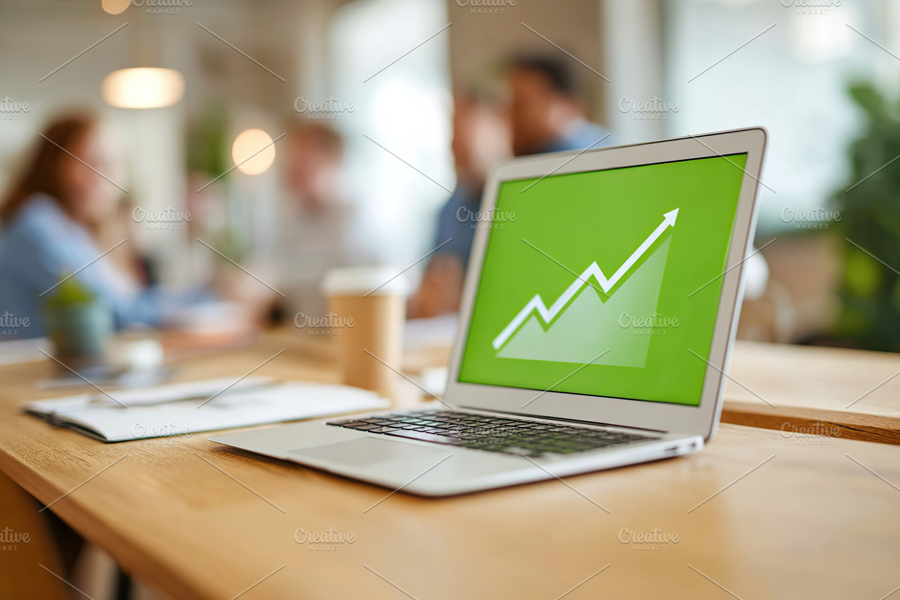 Close up of a laptop in an office setting displaying a positive growth trend on, a Business Photo by AlyaAnd