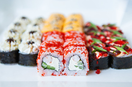 Sushi from Japanese cuisine. There are different types of sushi in the box. Del, a Food & Drink Photo by Artsaba Family