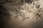 Woodcut Logo Mockup, a Product Mockup by Design Squad (Thumbnail 2 of 5)