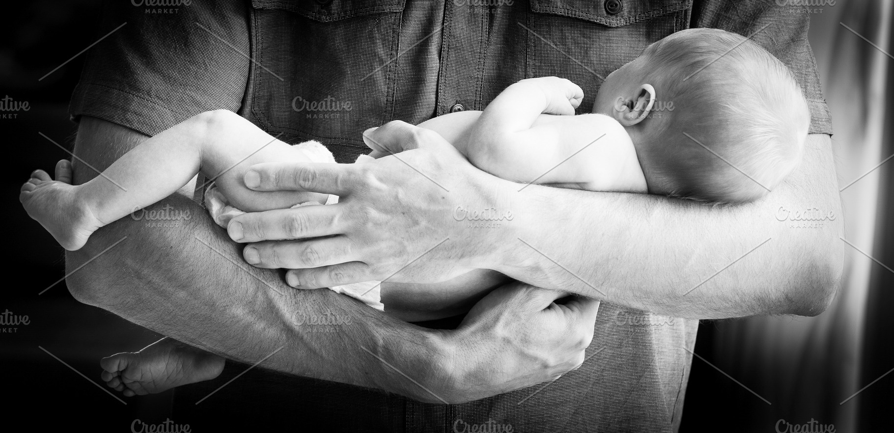 Father Holding Newborn Baby Boy Black and White, a Person Photo by THP Creative