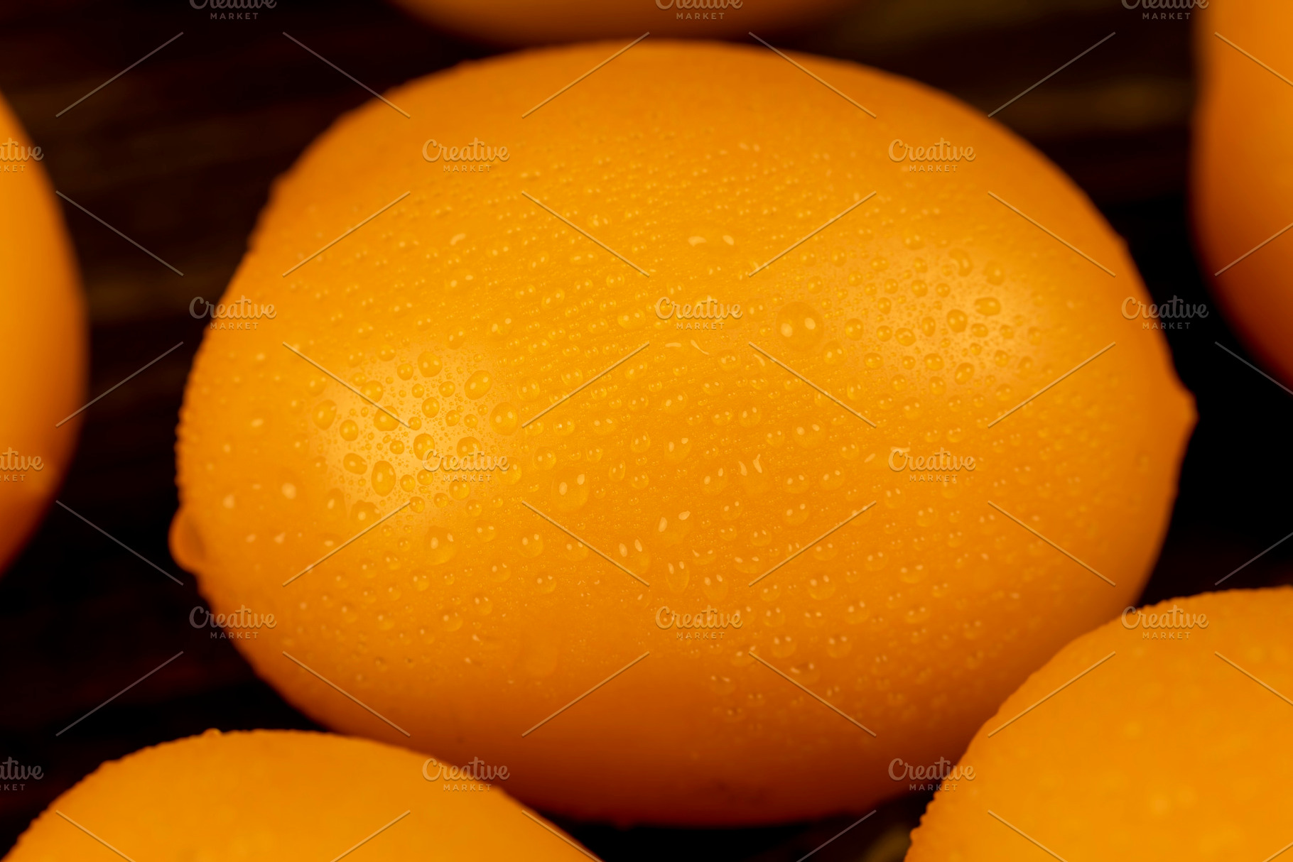 wet tomatoes of small size with juicy flesh, yellow tomatoes covered with drops, a Photo by rsoollAI