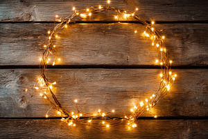 String lights form a circular shape, a Photo by Pavel_design