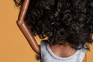 african-american female doll showing underarm hair