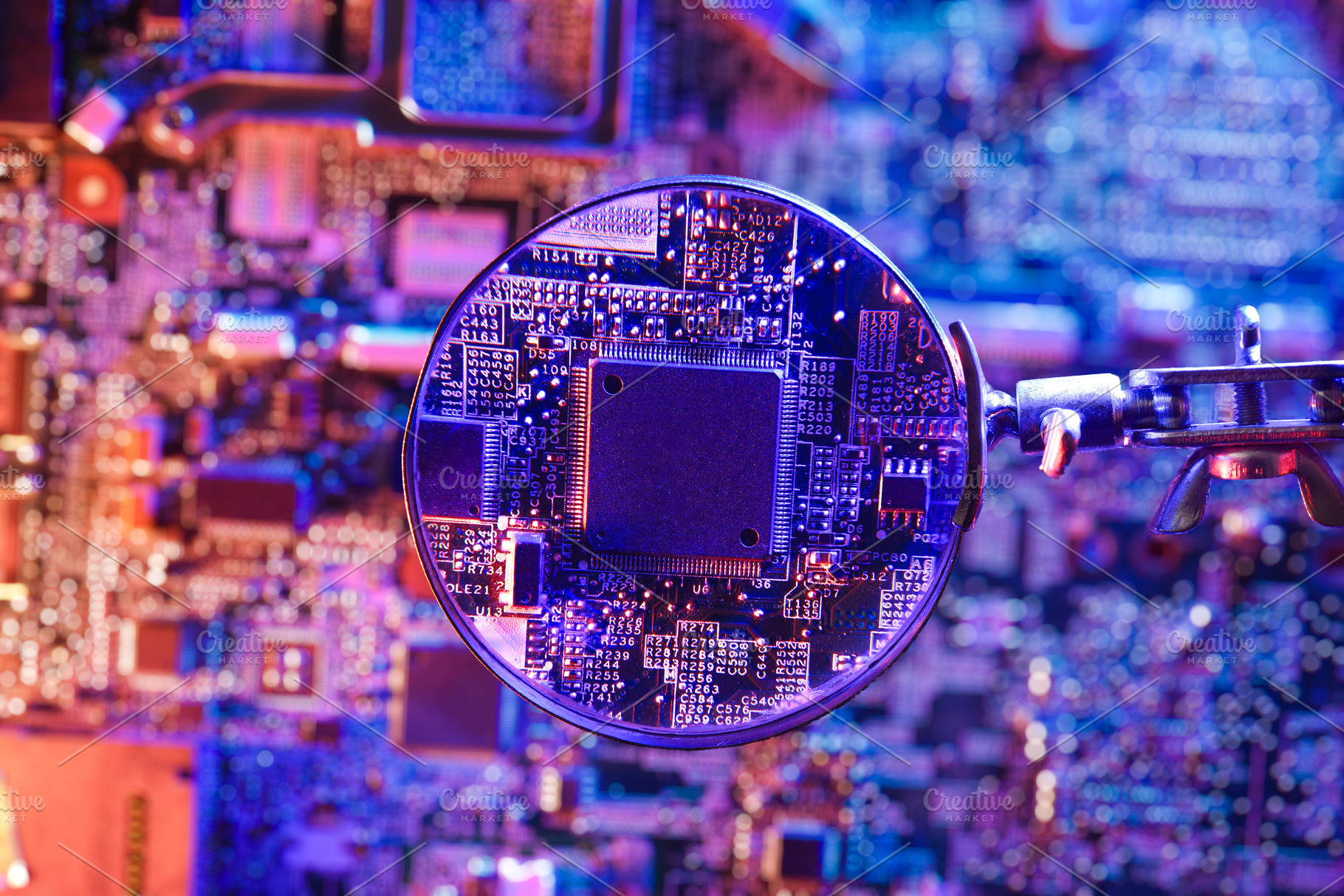 Magnifying Glass Inspecting Microchip on Circuit Board, a Technology Photo by Davizro's Market