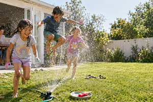 Children playing joyfully with backy, a Photo by Dvoevnore photos