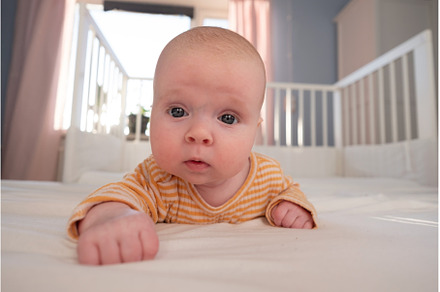 Funny caucasian baby lying on the, a Person Photo by Koldunova