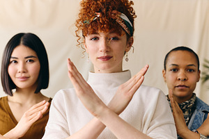 Young white woman gesturing Break The Bias in support of International Women's