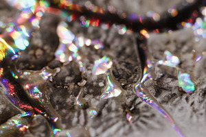 Rainbow liquid oil flow paint fractured bubble art, a Background Photo by Photo Drive Studio